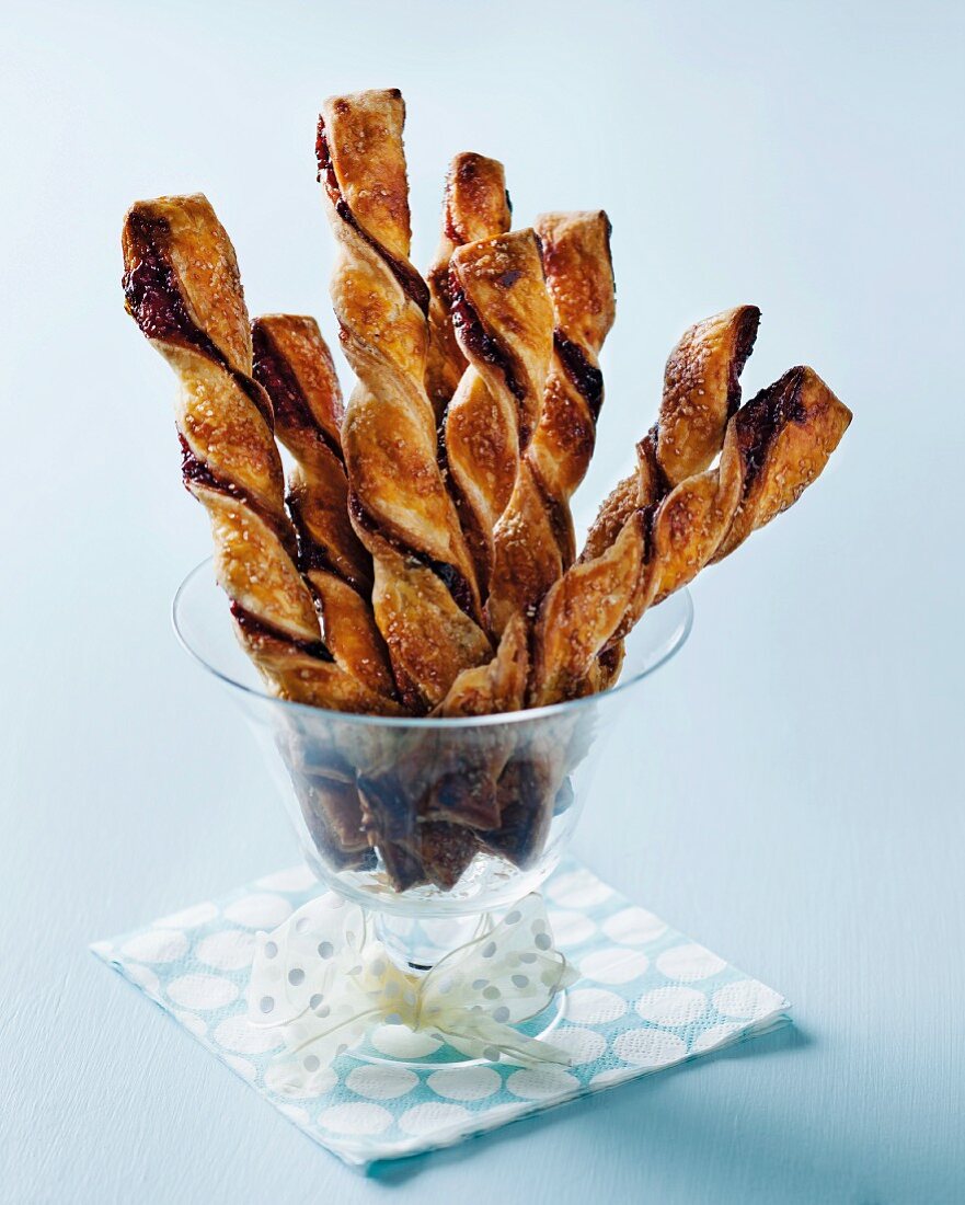 Puff pastry sticks with blackcurrant jam