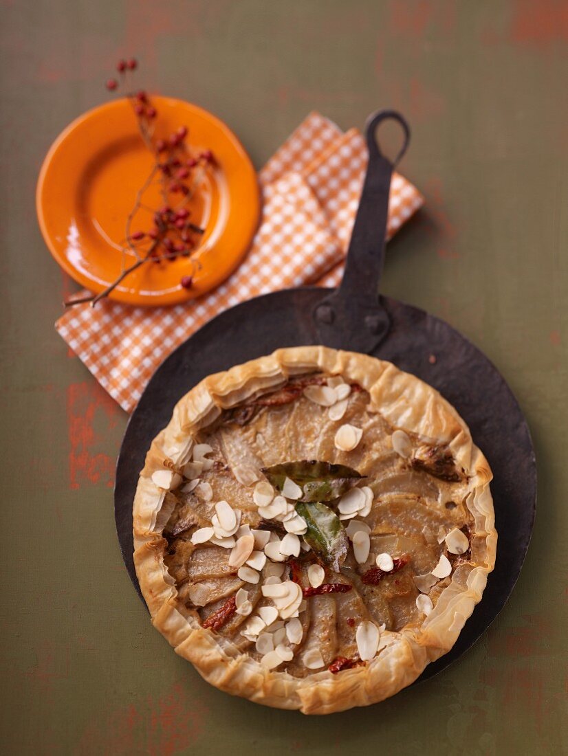 Kohlrabi tart with flaked almonds