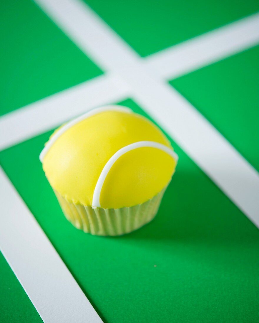 A tennis ball cupcake