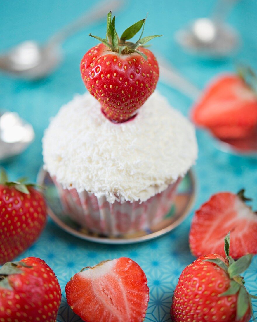 A strawberry and coconut cupcake