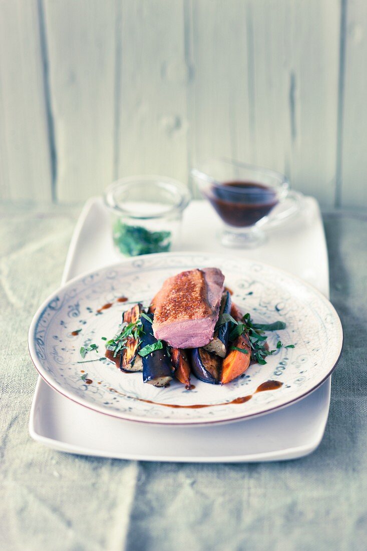 Duck breast with roasted vegetables and mint