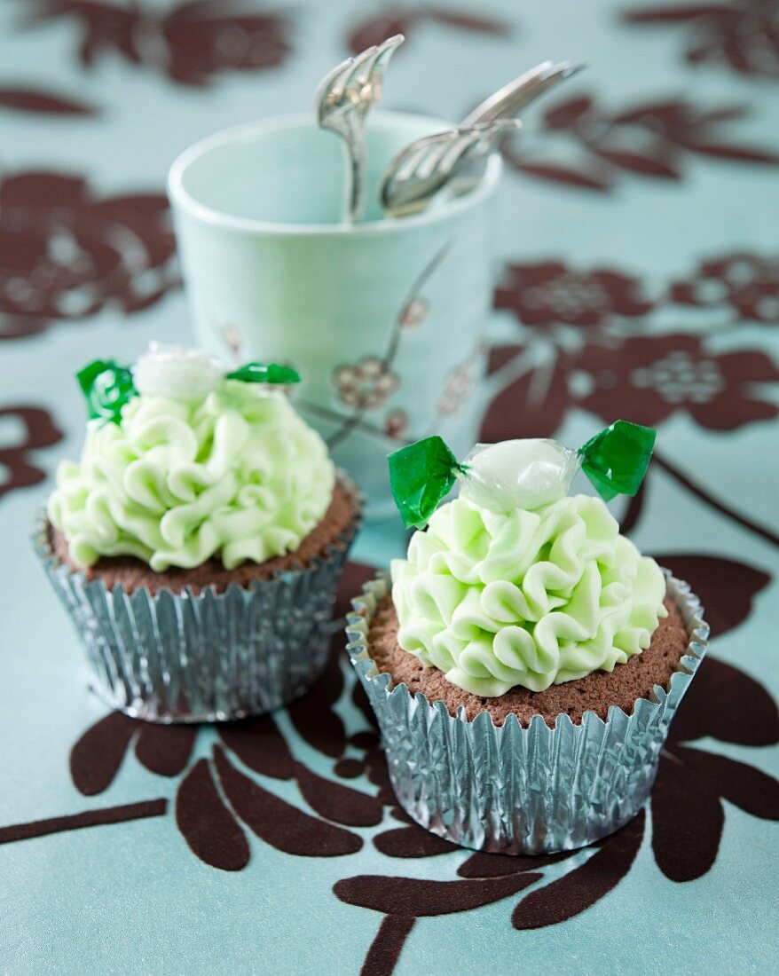 Chocolate cupcakes with mint frosting and mint bonbons