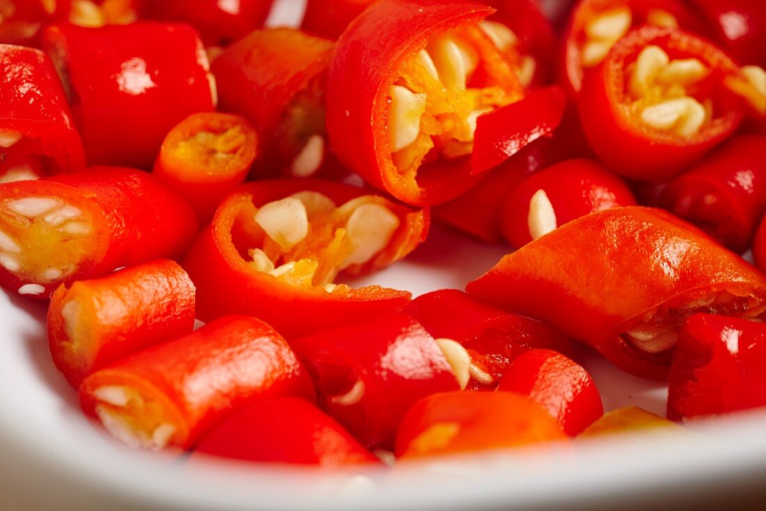 Sliced red chilli peppers (close-up)