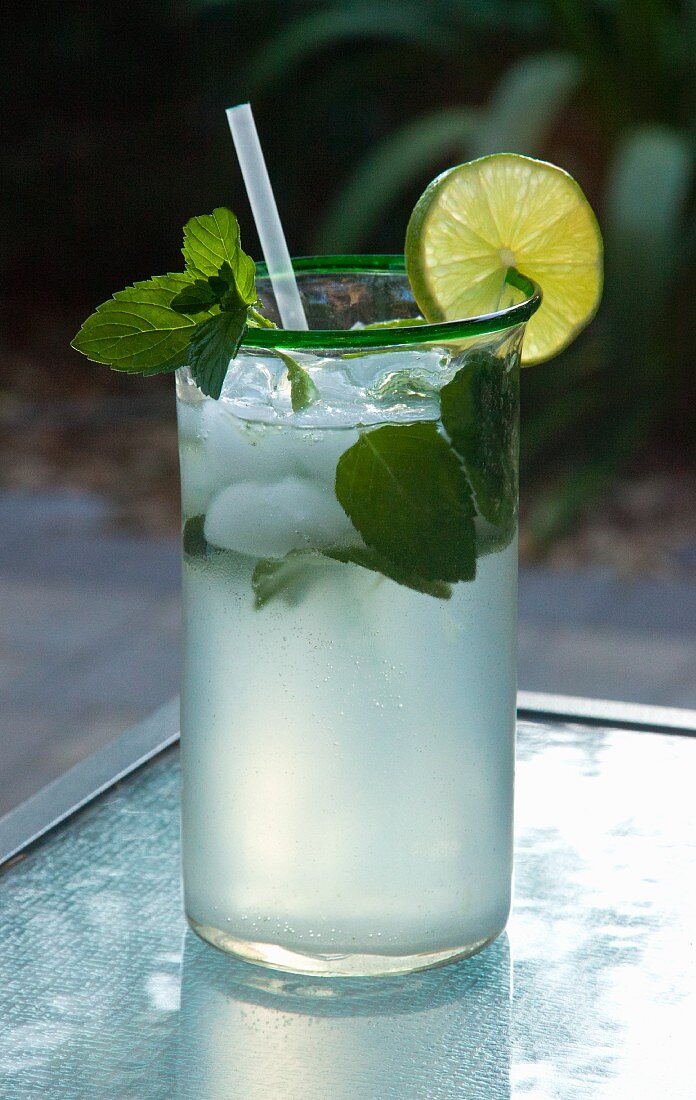 A Mojito (cocktail with rum, lime juice and mint)