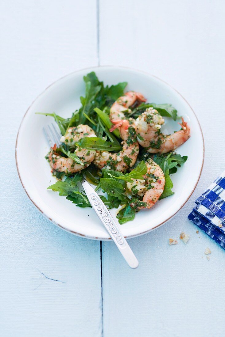 Marinated prawns on a rocket salad
