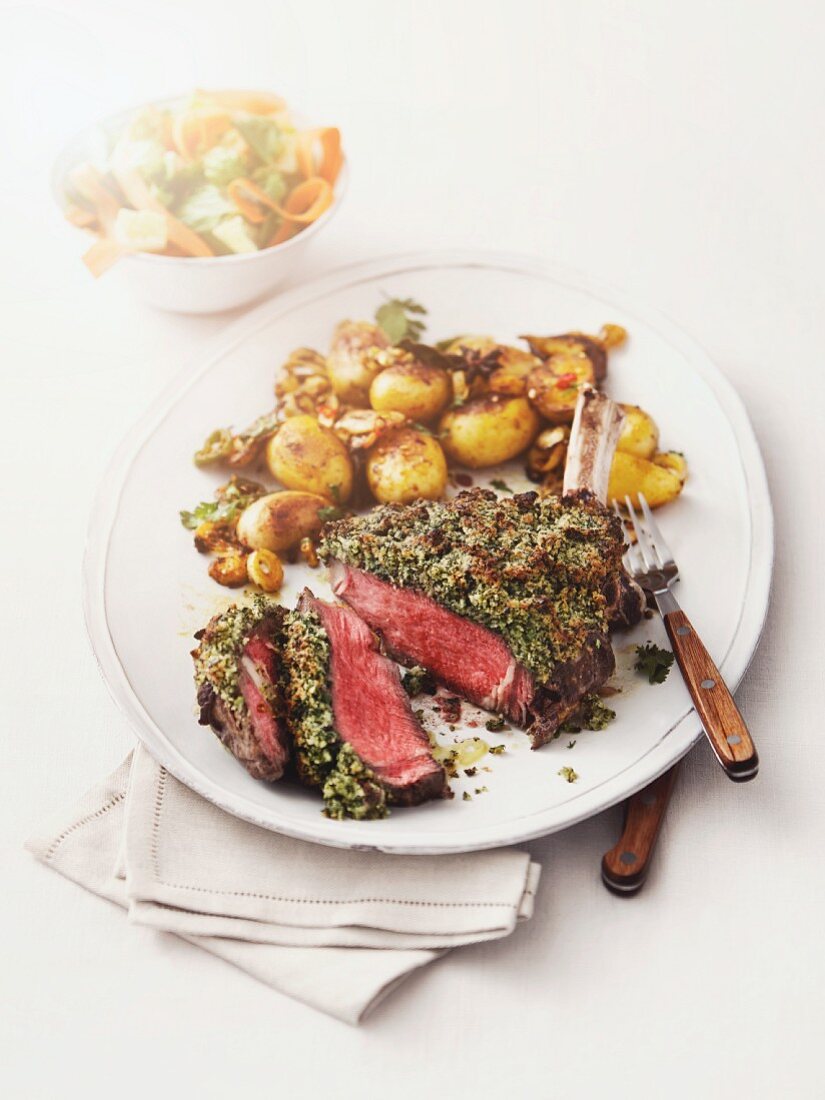 Beef rib with a herb crust and fried potatoes
