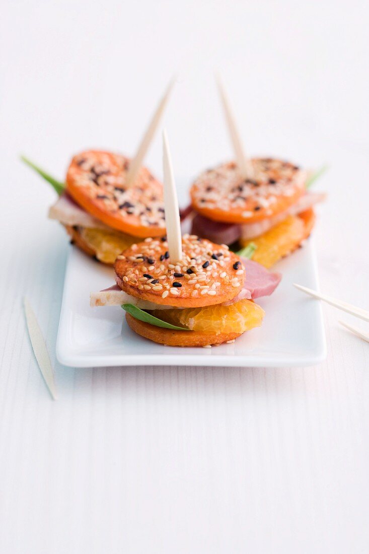 Pumpkin and mandarin skewers with duck breast