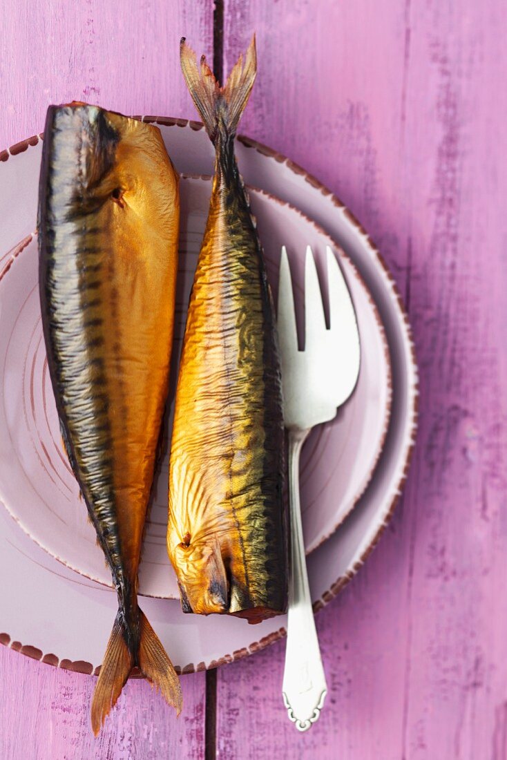 Smoked mackerel on a plate with a fork
