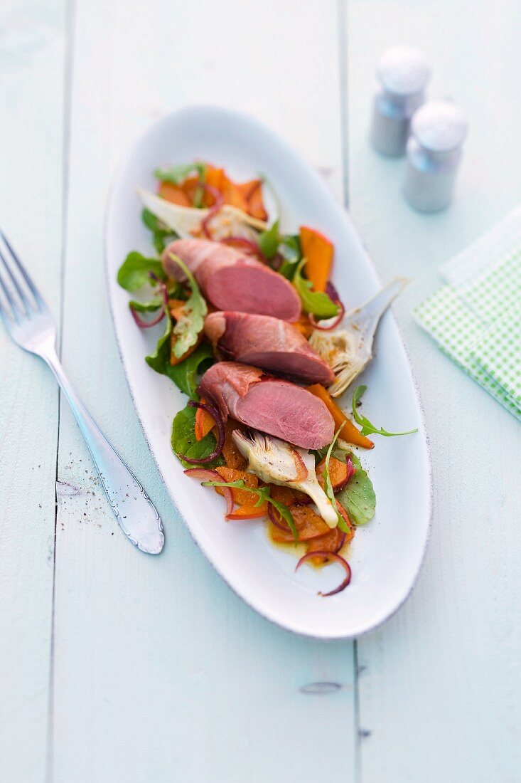 Saddle of lamb on a pumpkin salad