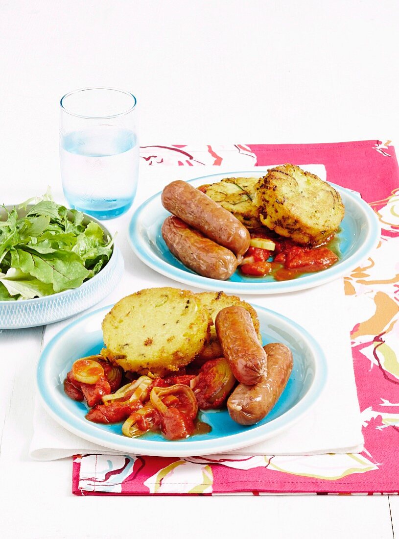 Polenta cakes with chipolatas