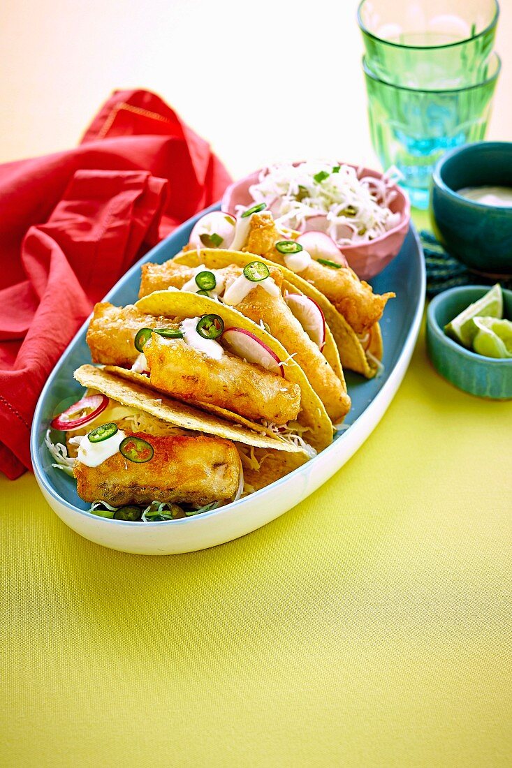 Fish tacos with jalapeno and radish slaw