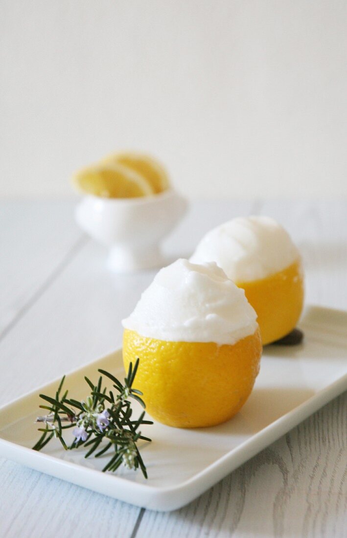 Lemon sorbet served in lemons