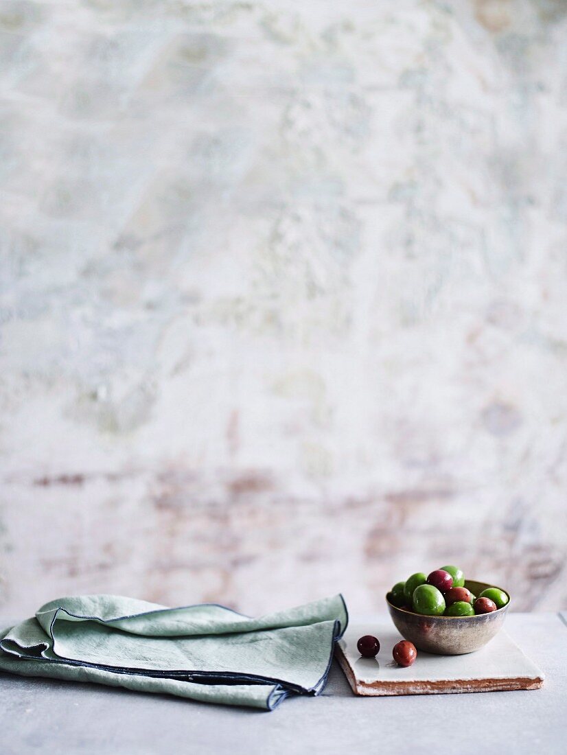 Still life with green and brown olives