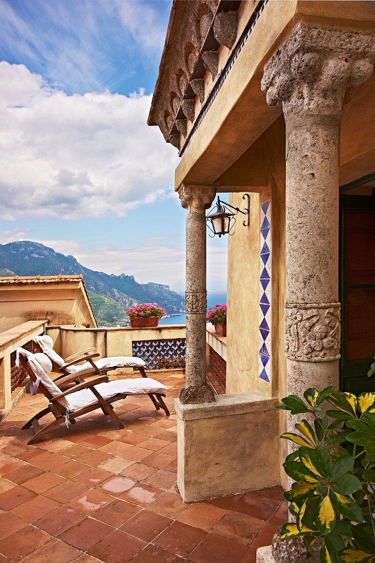 Roof terrace with terracotta floor and porch on columns (Villa Cimbrone Hotel)