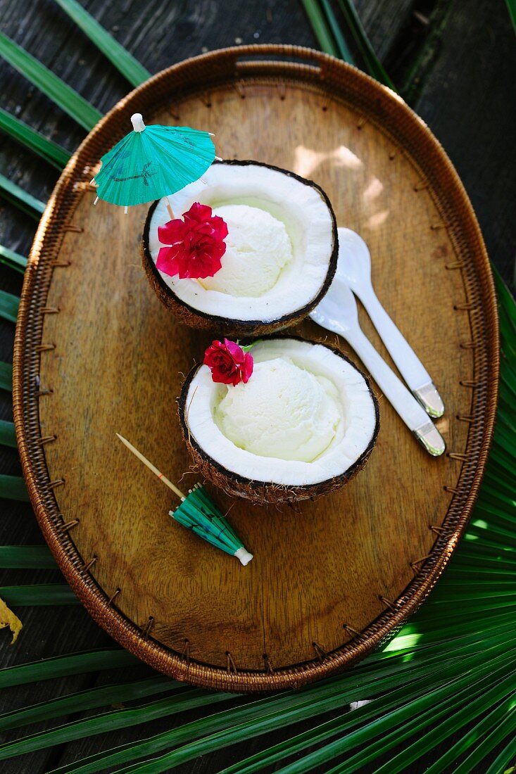 Pina colada ice cream served in a halved coconut