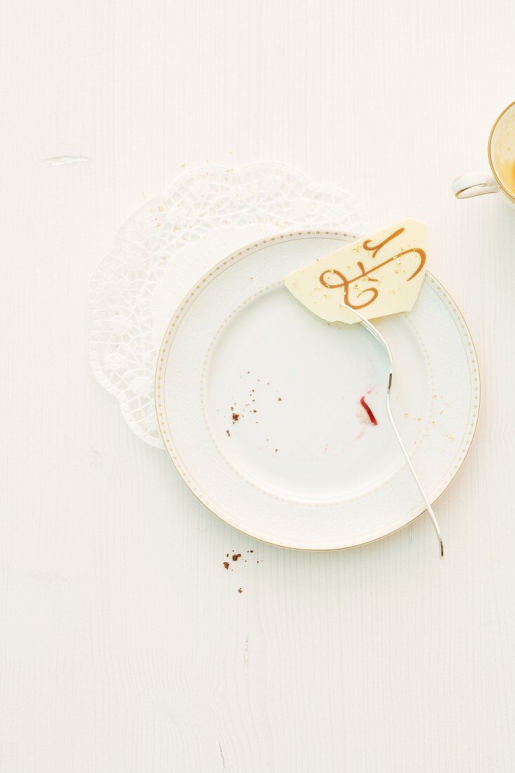 Crumbs and the remains of a Christmas cake on a plate