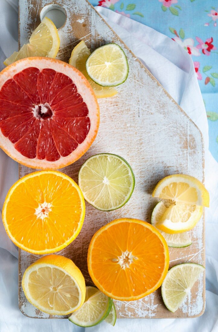Citrus fruits on a wooden board