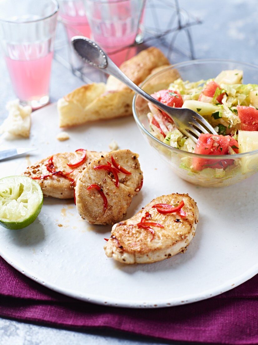 Mini turkey steaks with chilli and lettuce with melon
