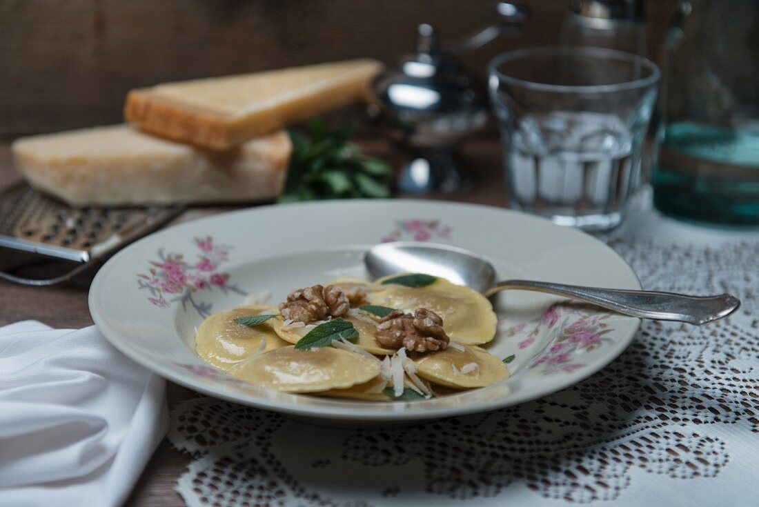 Spinach and ricotta ravioli with sage butter and walnuts