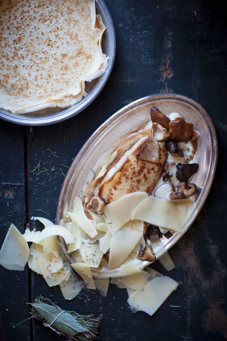 Soufflé crepes with shiitake mushrooms and Gruyere