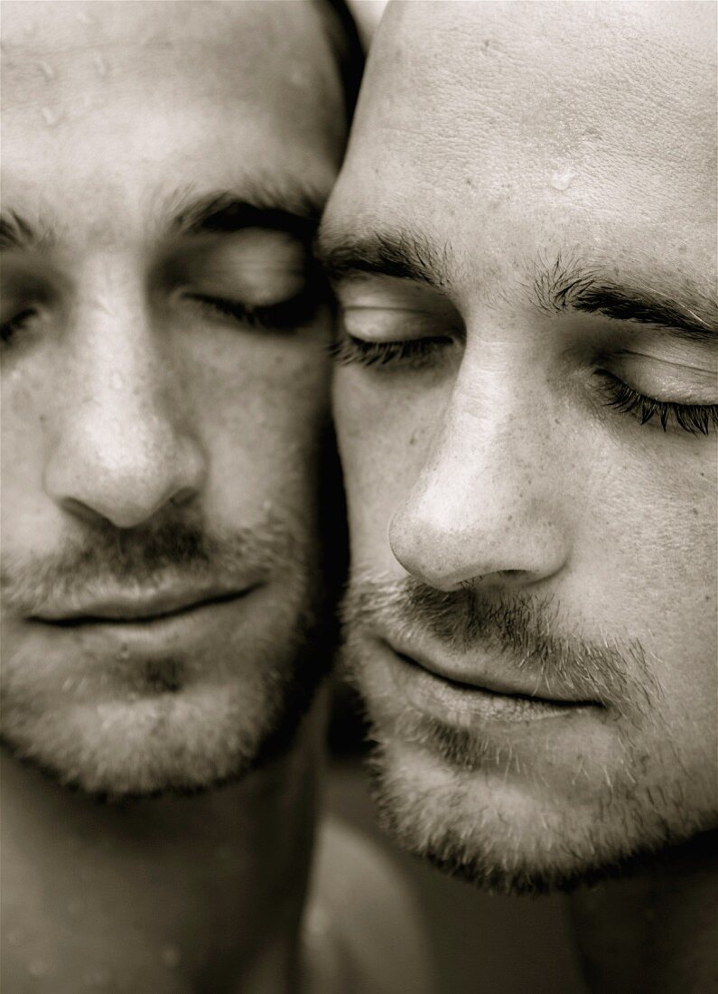 A close-up portrait of twin brothers (sepia photo)