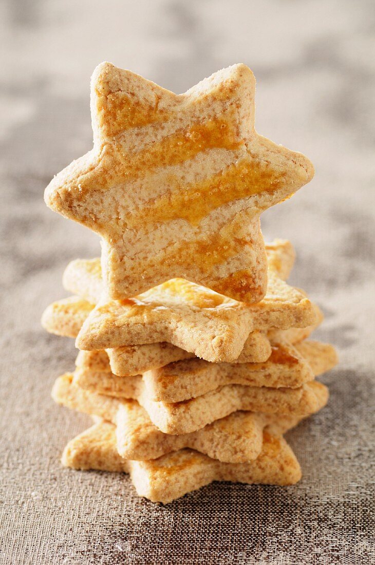 A stack of star shaped biscuits with one standing on edge