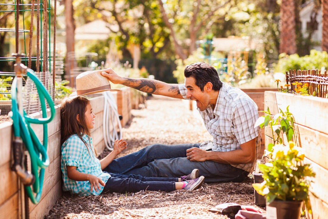 Father and daughter in garden