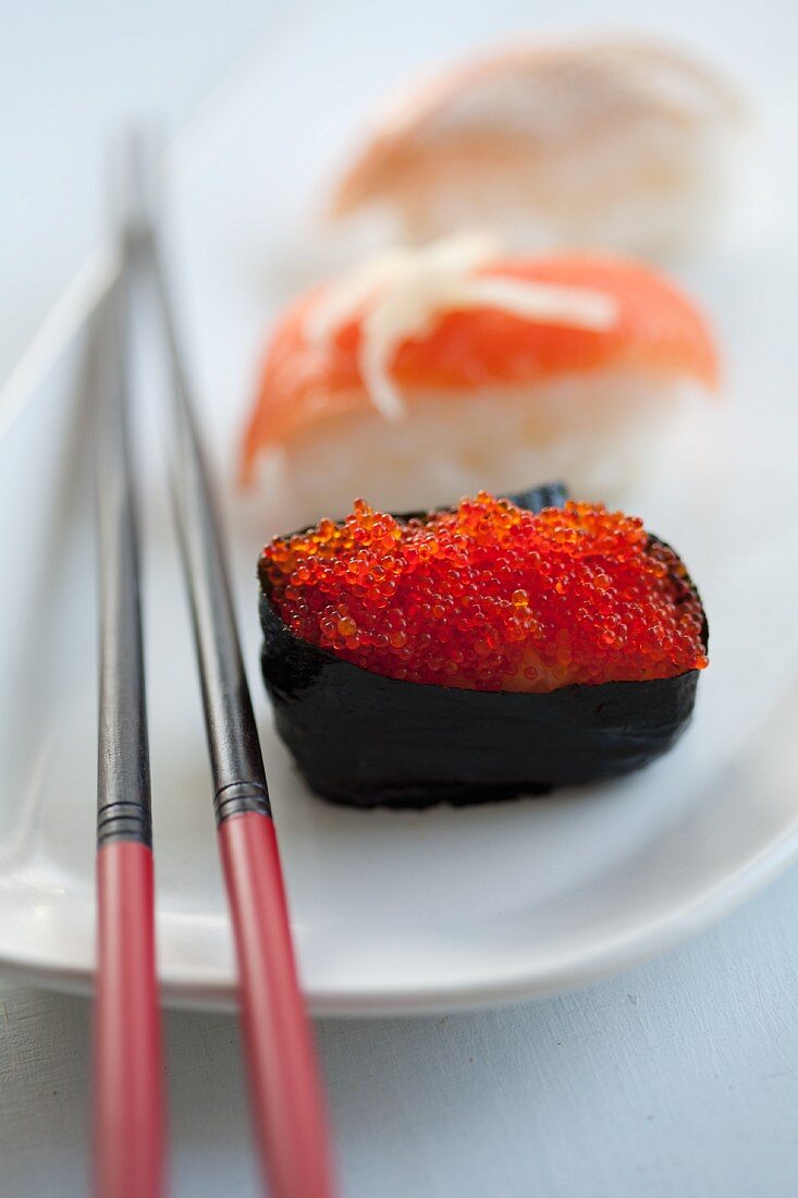 Sushi with salmon caviar and salmon
