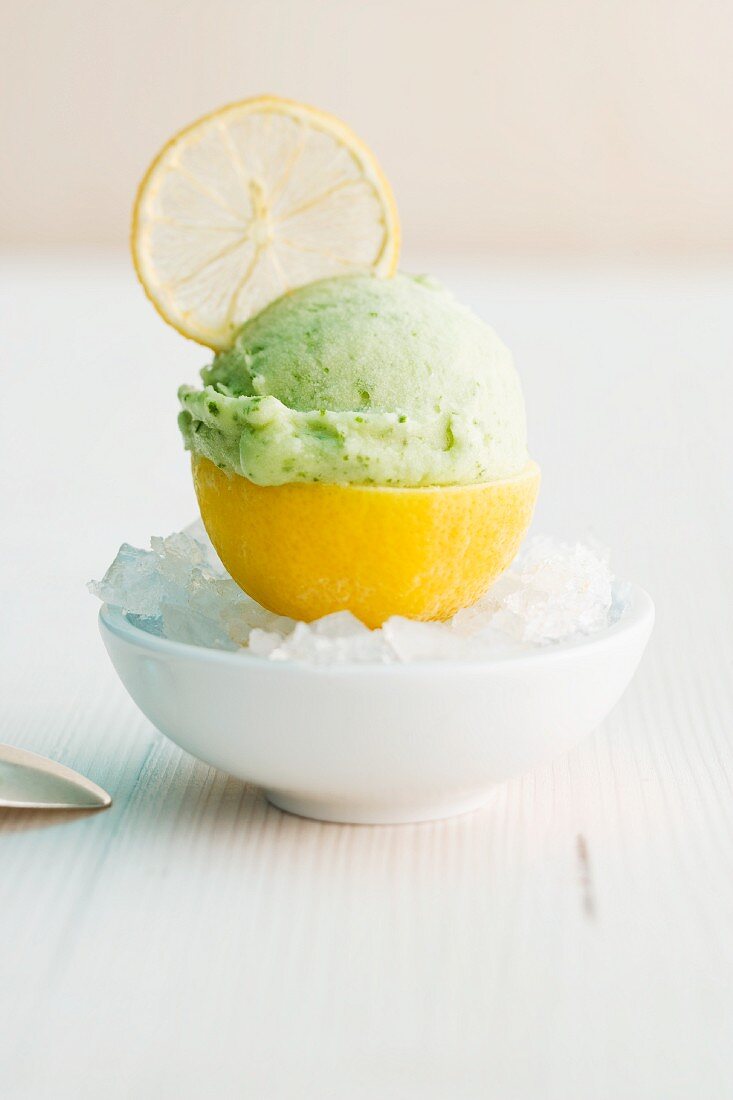 Lemon and basil ice cream served in a lemon skin