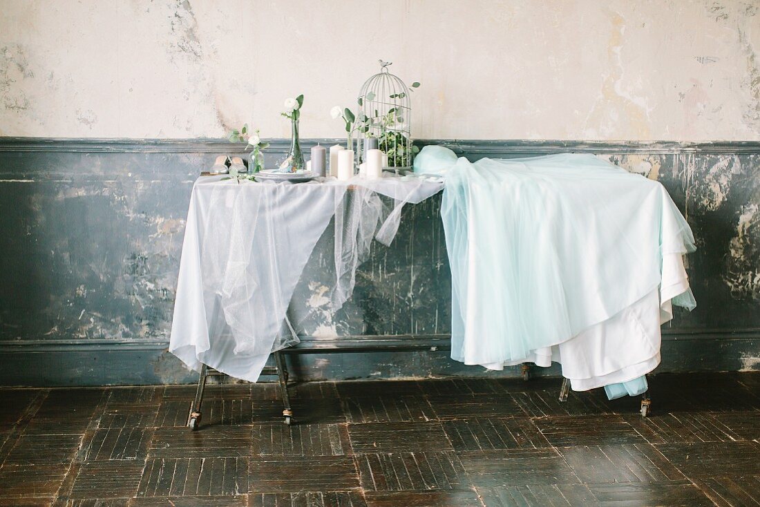 Fairy-tale dining table decorated for wedding in vintage interior