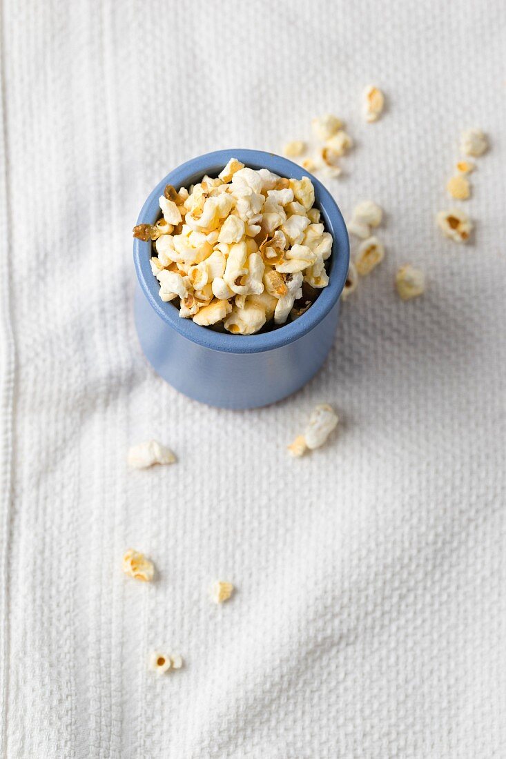 Popcorn in a blue cup