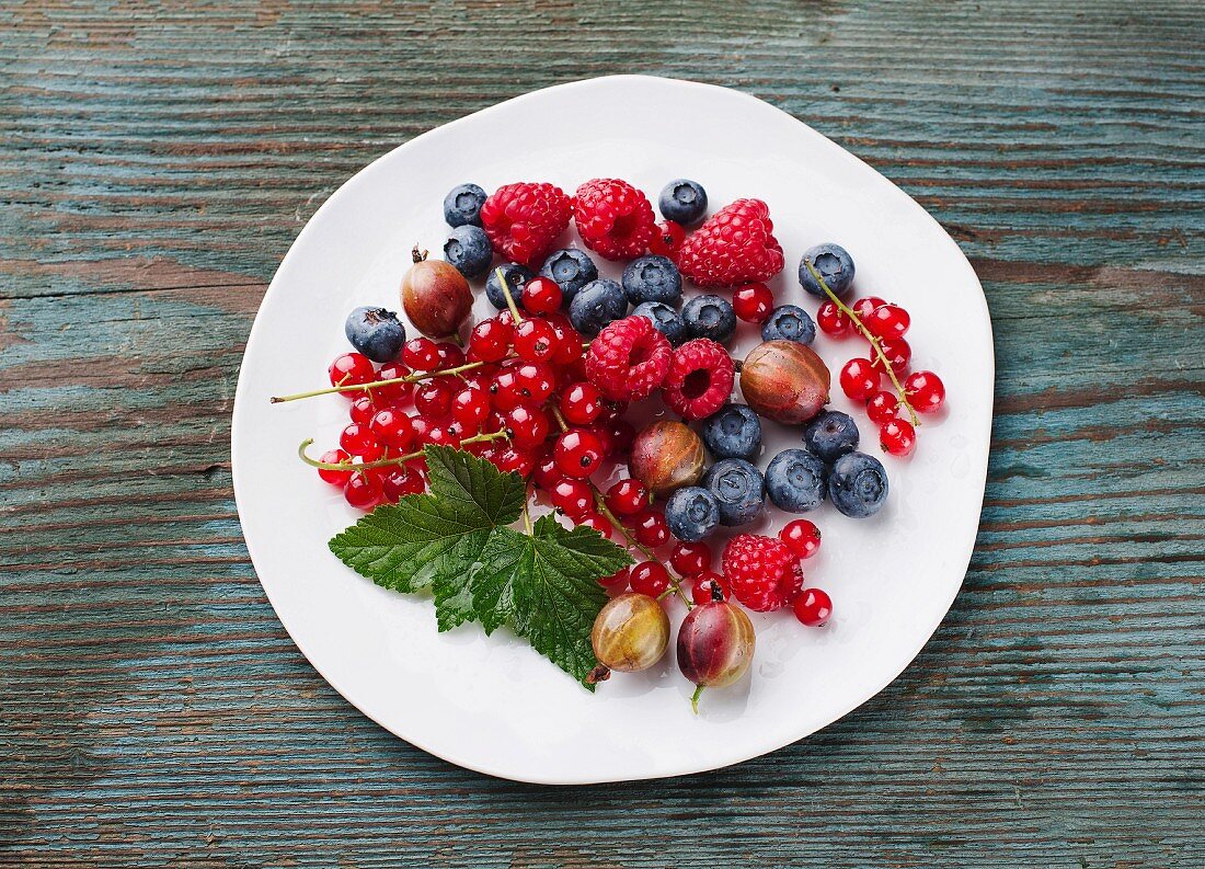 Fresh berries on a white plate