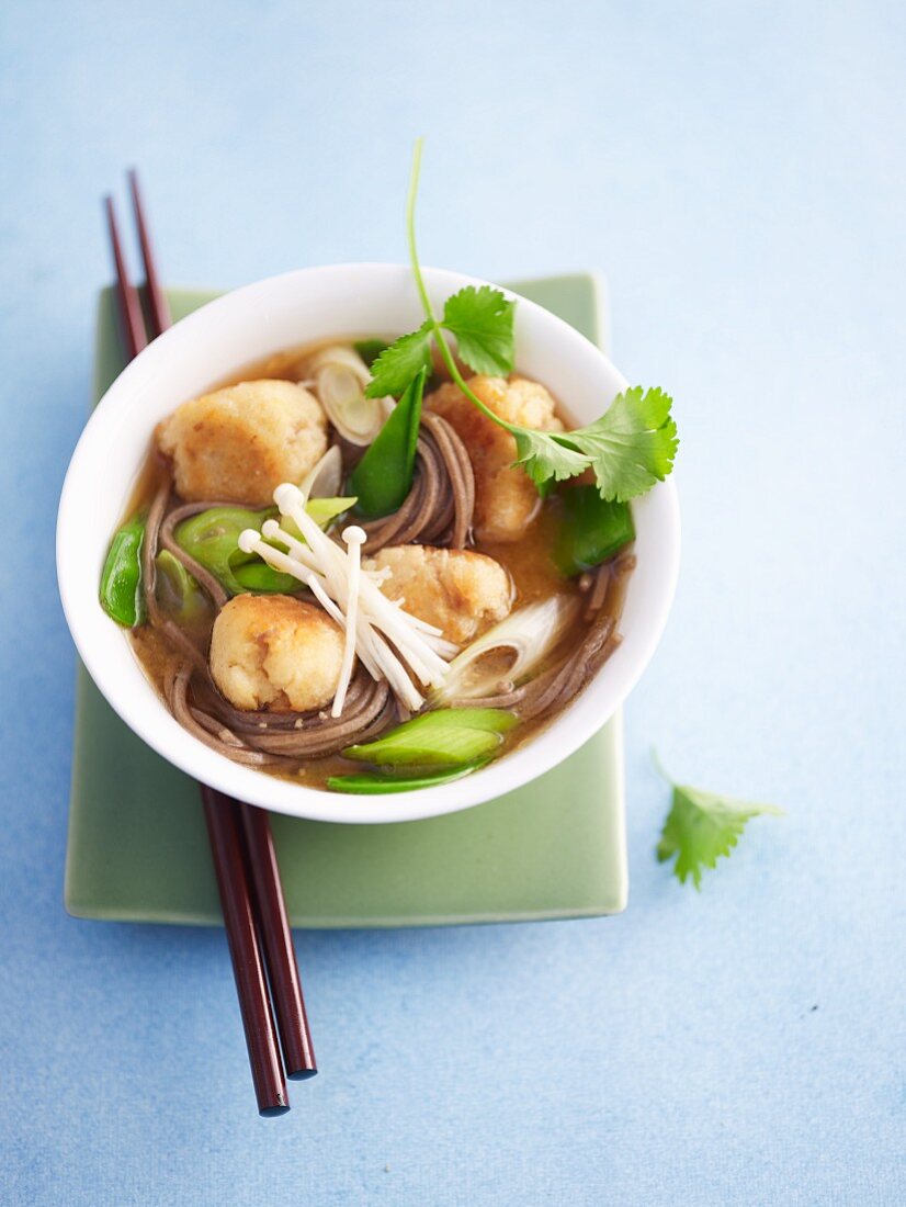 Oriental cod soup with noodles and dumplings