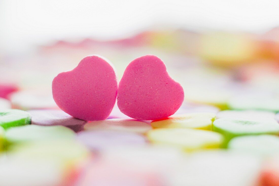 Two pink sugar hearts
