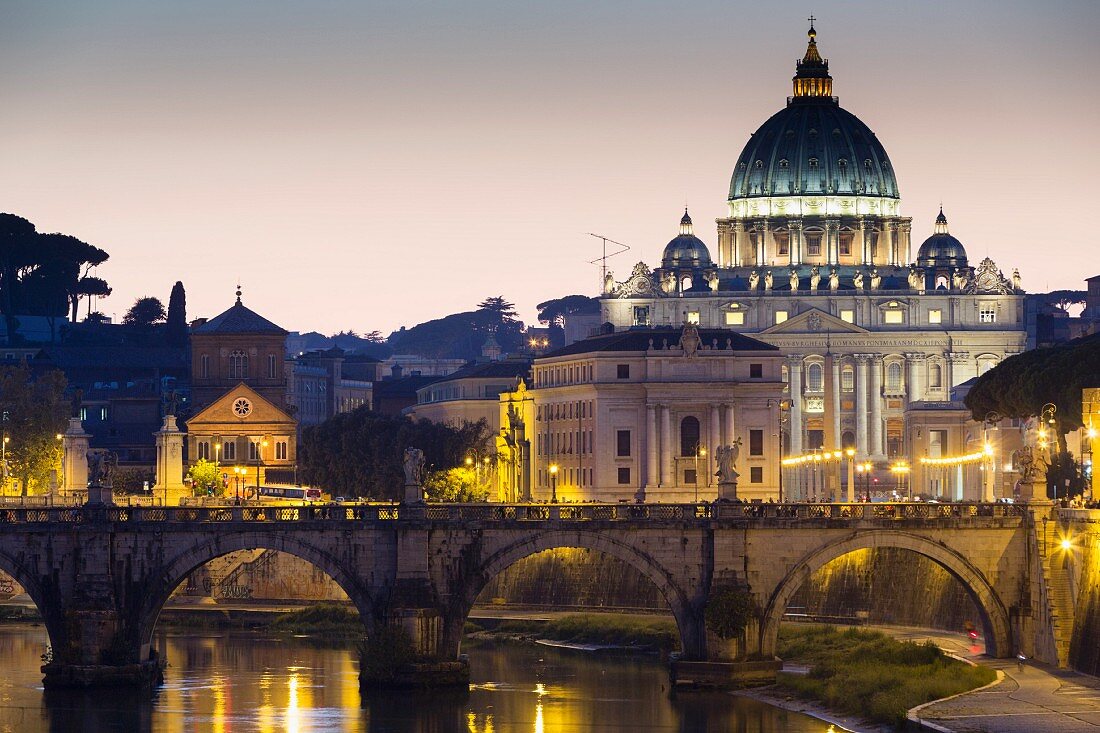 An evening view over the River Tiber of St Peter's Cathedral, Vatican, Rome