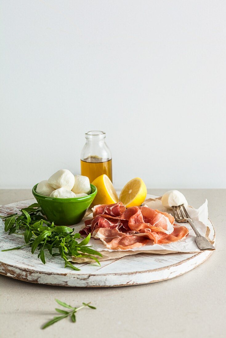 Ingredients for salad with Prosciutto and bocconcini mozzarella