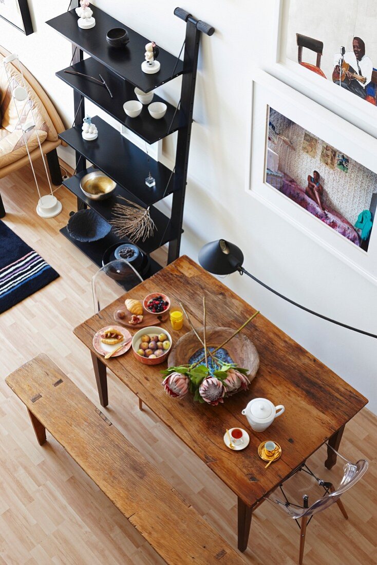 Wooden table and bench seen from above