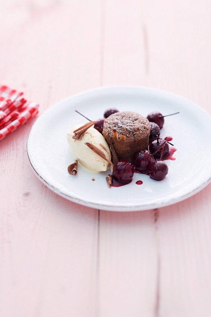 Coulant au chocolat with cherries and vanilla ice cream