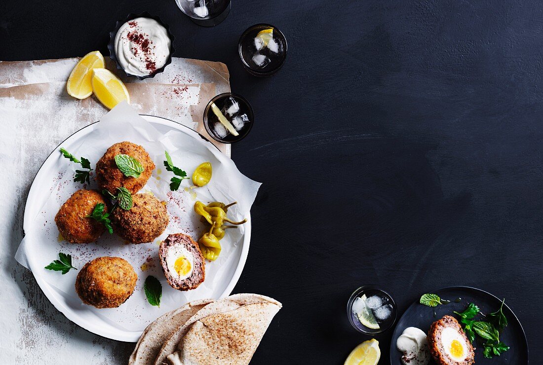 Oriental spiced scotch eggs with tahini yoghurt