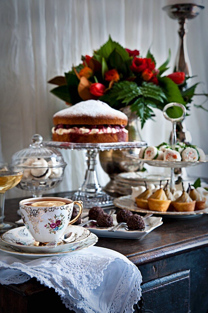 Cake, biscuits and canapés for afternoon tea