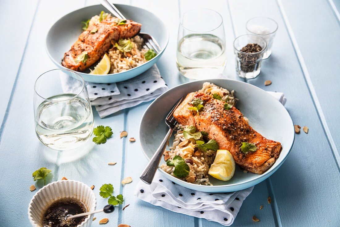 Oven-roasted salmon fillets on almond rice