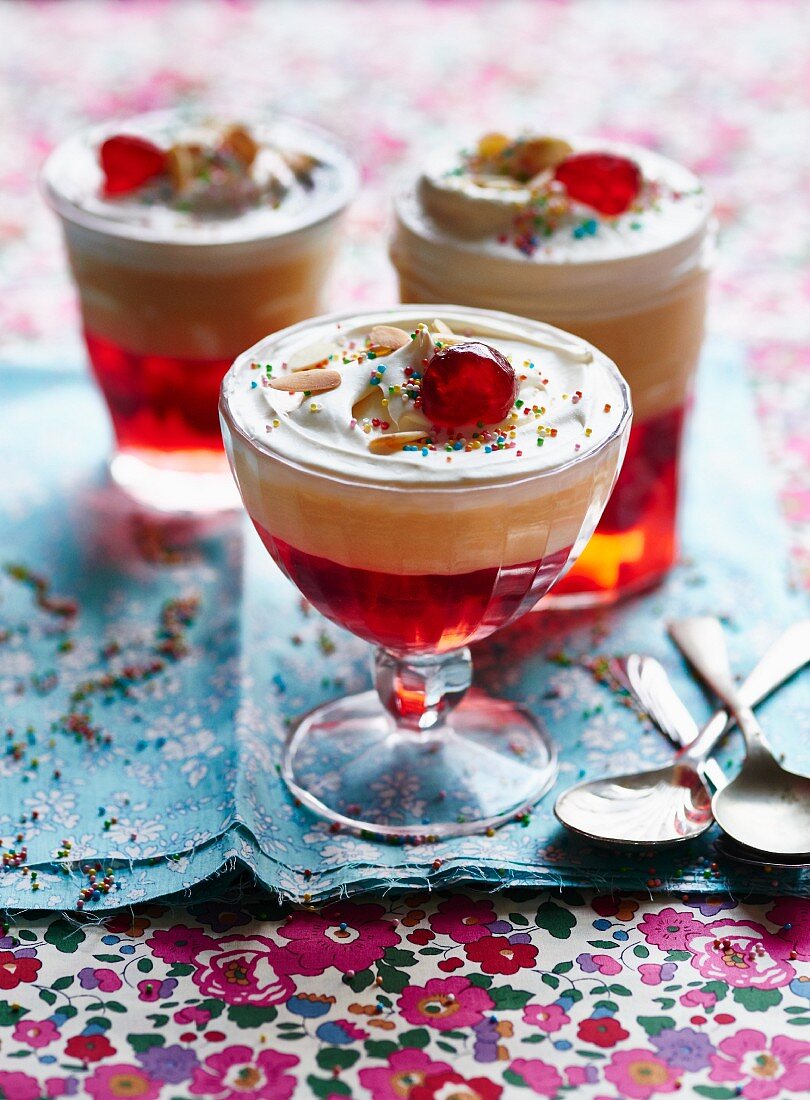 Trifle with glace cherries and flaked almonds