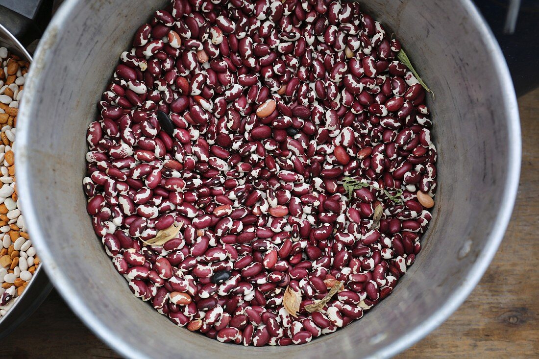 A bucket of cow peas at a market
