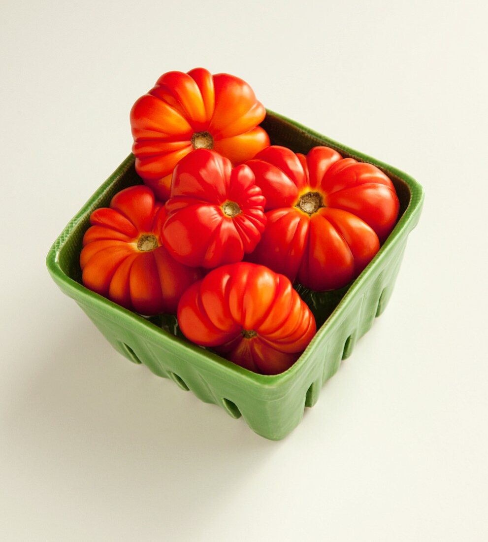 Heirloom tomatoes in a ceramic dish