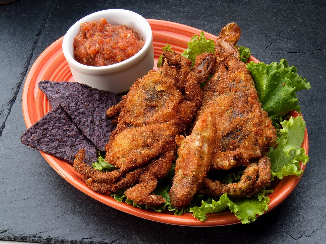Fried soft shell crabs with tortilla chips and salsa
