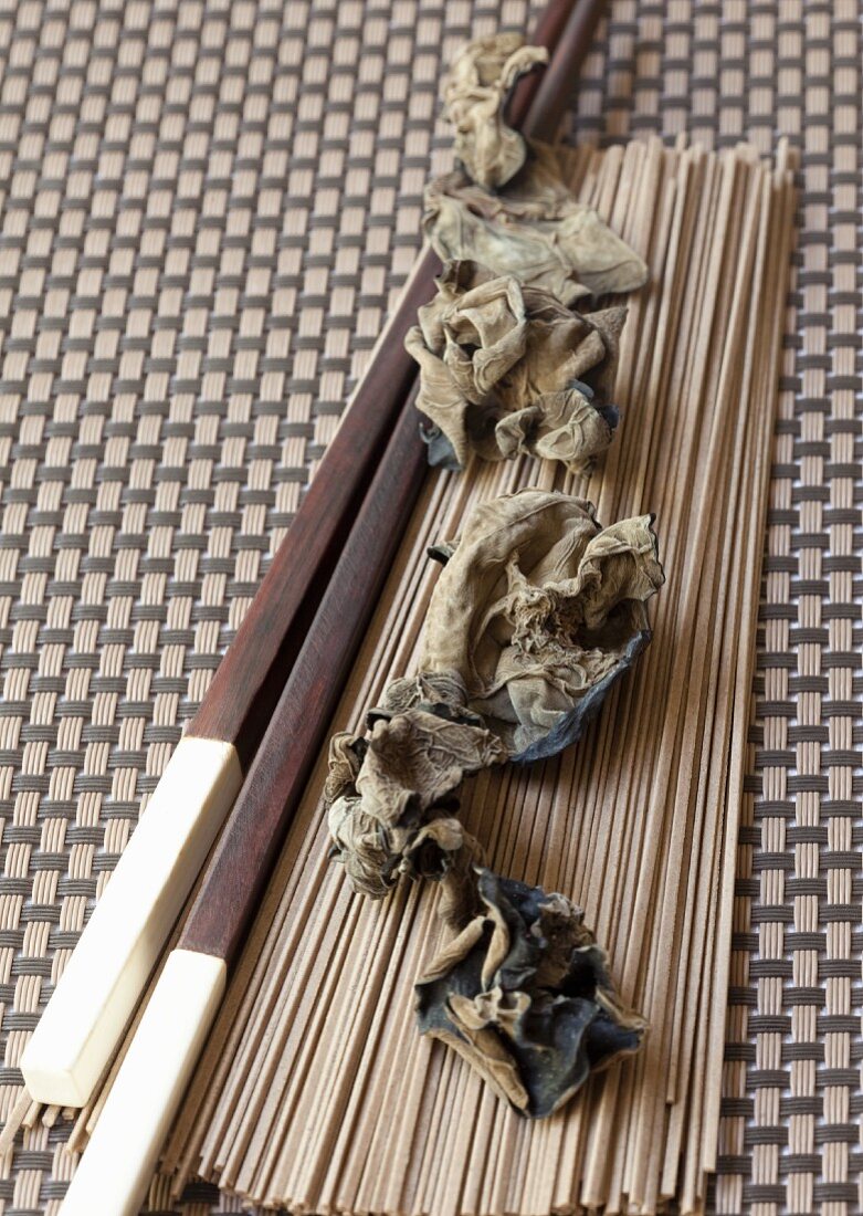 Soba noodles, dried mu-err mushrooms and chopsticks