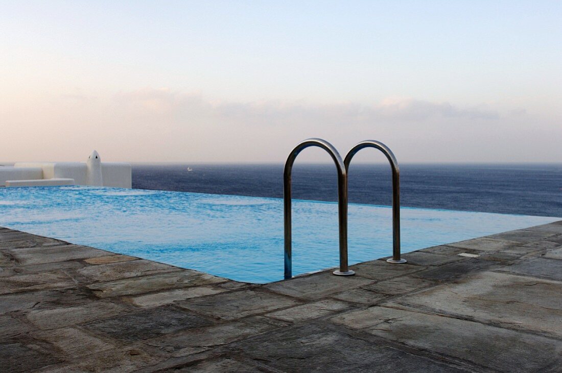 Outdoor infinity pool with panoramic ocean view