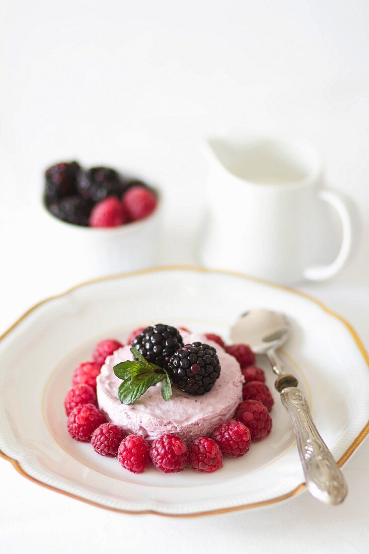 Raspberry cream with fresh raspberries