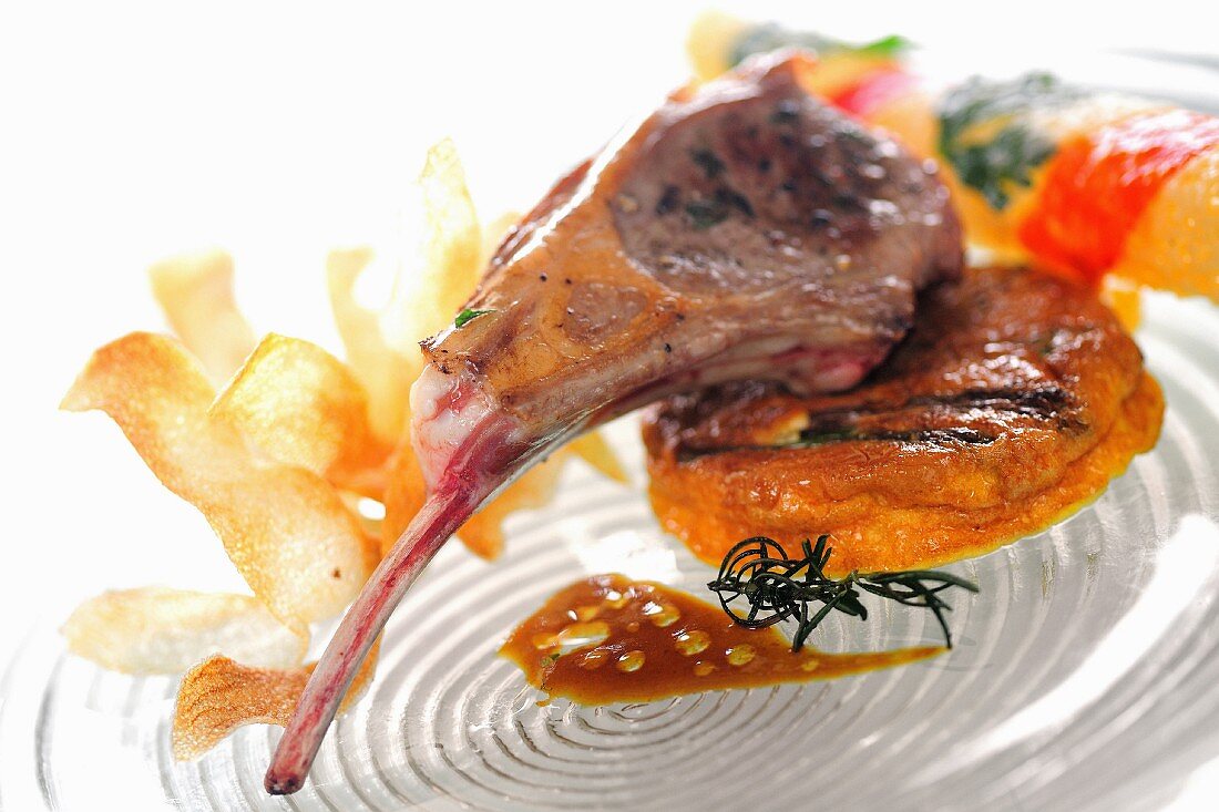 A lamb chop with pepper sauce
