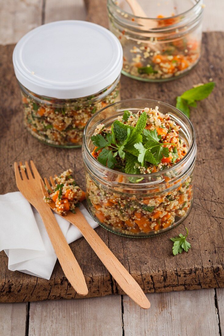 Mixed quinoa in a jar with coriander